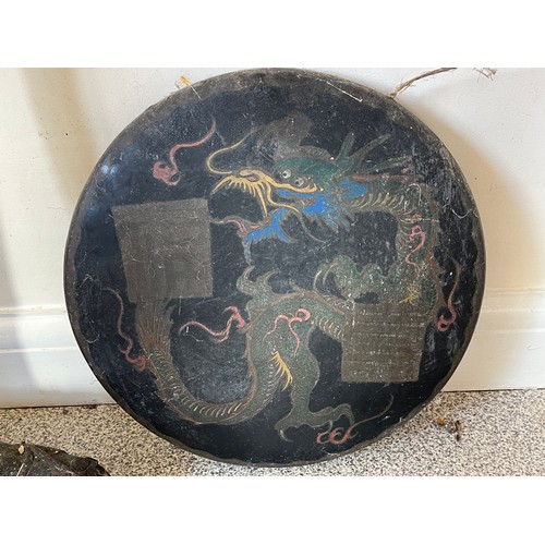 33 - Floor standing gong decorated with a dragon on a carved support.

This lot is collection only