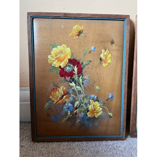 39 - A pair of painted floral studies on wooden panels, each measures 25 cm x 32 cm.

This lot is availab... 