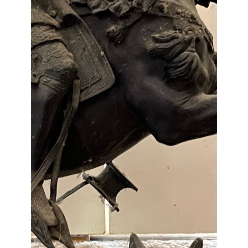 60 - A bronzed cast figure of a mounted knight, 52 cm high.

This lot is collection only