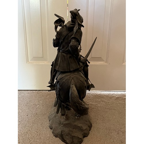 60 - A bronzed cast figure of a mounted knight, 52 cm high.

This lot is collection only