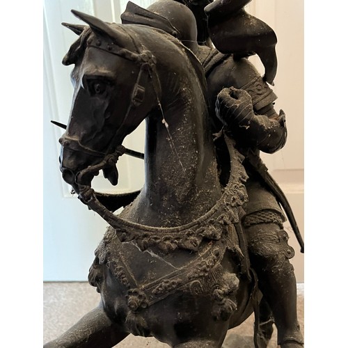 60 - A bronzed cast figure of a mounted knight, 52 cm high.

This lot is collection only