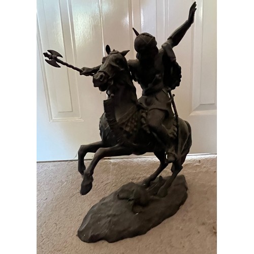 61 - A bronzed cast figure of a Saracen and his charger, 54 cm high.

This lot is collection only