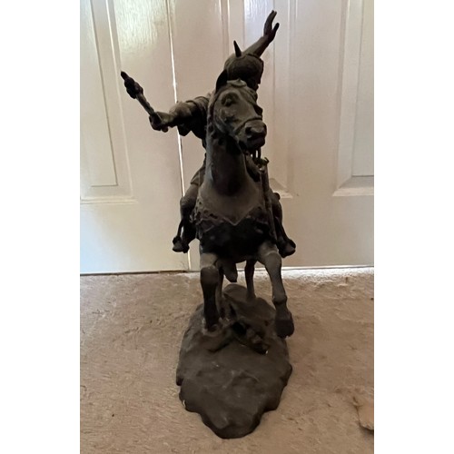 61 - A bronzed cast figure of a Saracen and his charger, 54 cm high.

This lot is collection only