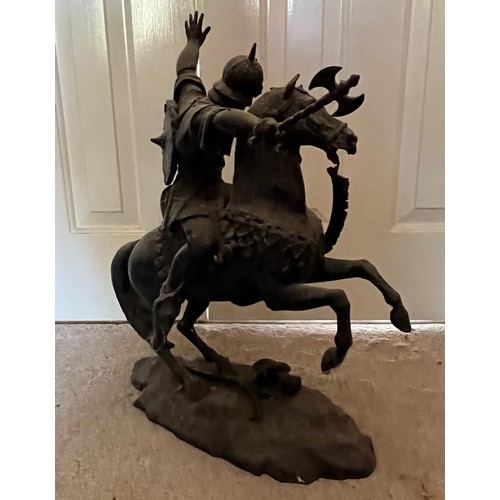 61 - A bronzed cast figure of a Saracen and his charger, 54 cm high.

This lot is collection only