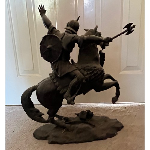 61 - A bronzed cast figure of a Saracen and his charger, 54 cm high.

This lot is collection only