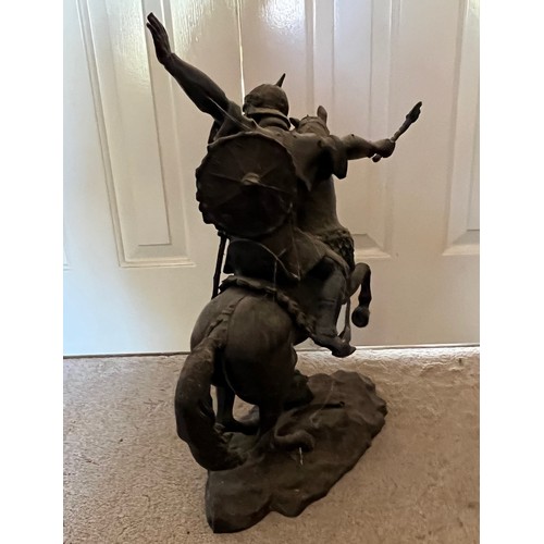 61 - A bronzed cast figure of a Saracen and his charger, 54 cm high.

This lot is collection only