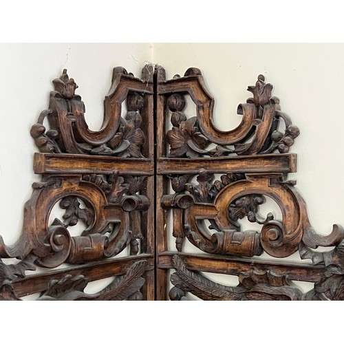 64 - Black forest hand carved corner shelf with winged mythical creatures.

This lot is collection only