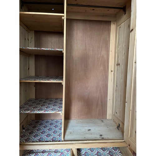 65 - Scandinavian furniture, a Norwegian pine wardrobe early C20th, 121 cm wide x 60 cm deep 185 cm high.... 