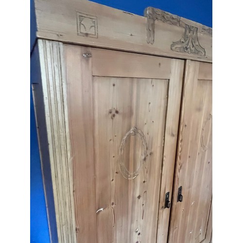 65 - Scandinavian furniture, a Norwegian pine wardrobe early C20th, 121 cm wide x 60 cm deep 185 cm high.... 