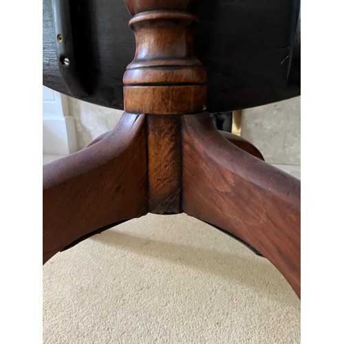 66 - Mahogany tilt top dinning table,

This lot is collection only