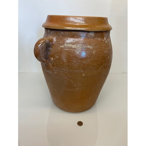 69 - A large stoneware lidded storage jar, ideal for planting up, 31 cm dia and 41 cm high without the li... 