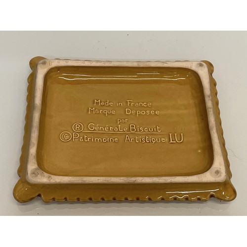 75 - Ceramic advertising French biscuit shaped promotional platter 25 cm x 20 cm.

This lot is available ... 