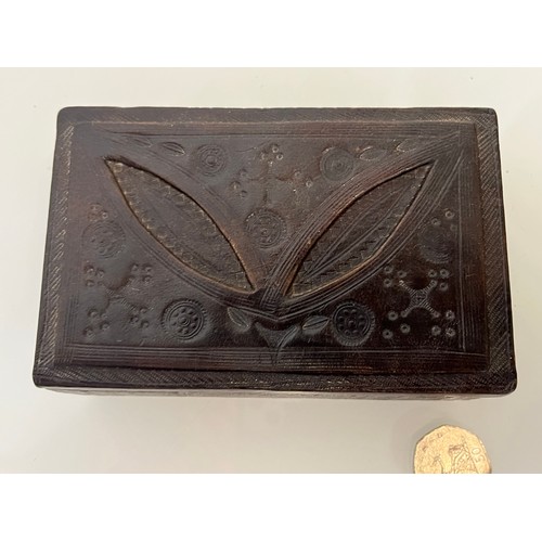 77 - Leather covered box of African origin with detailed decoration all over, 14 cm x 9 cm x 5 cm high.

... 