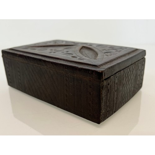 77 - Leather covered box of African origin with detailed decoration all over, 14 cm x 9 cm x 5 cm high.

... 