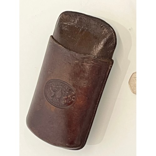 78 - Leather glasses case with embossed royal crest, 15 cm x 8 cm.

This lot is available for in-house sh... 