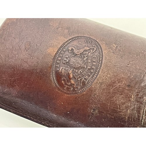 78 - Leather glasses case with embossed royal crest, 15 cm x 8 cm.

This lot is available for in-house sh... 