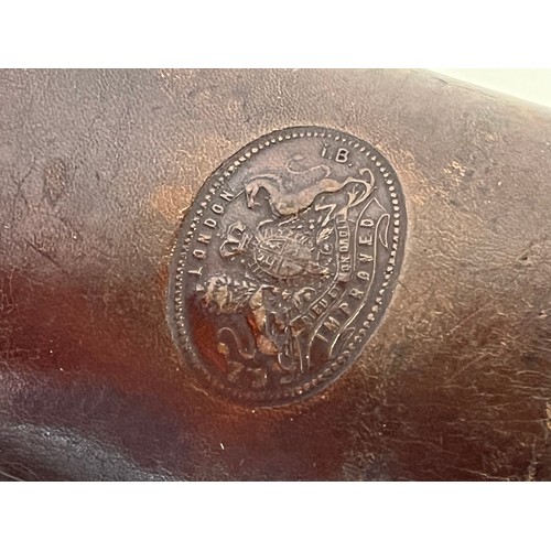 78 - Leather glasses case with embossed royal crest, 15 cm x 8 cm.

This lot is available for in-house sh... 