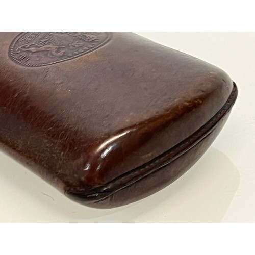 78 - Leather glasses case with embossed royal crest, 15 cm x 8 cm.

This lot is available for in-house sh... 