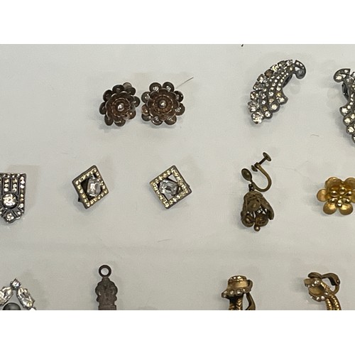 81 - Charm bracelets, charms and a ear rings.

This lot is available for in-house shipping