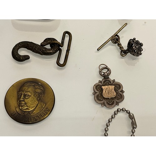 85 - A collection of mixed items, compass, badges, watch fobs etc.

This lot is available for in-house sh... 