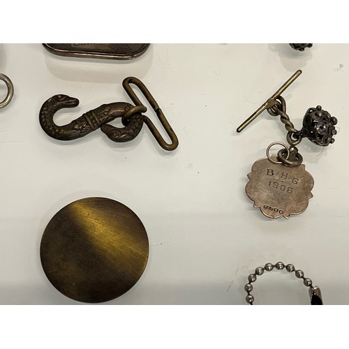 85 - A collection of mixed items, compass, badges, watch fobs etc.

This lot is available for in-house sh... 