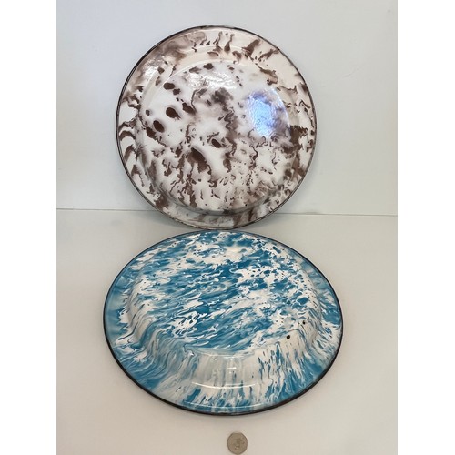 95 - Two large white enamelled dishes with marbled backs, 45 cm diameter x 4.5 cm deep.

This lot is avai... 