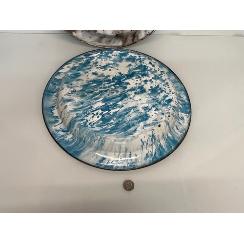 95 - Two large white enamelled dishes with marbled backs, 45 cm diameter x 4.5 cm deep.

This lot is avai... 