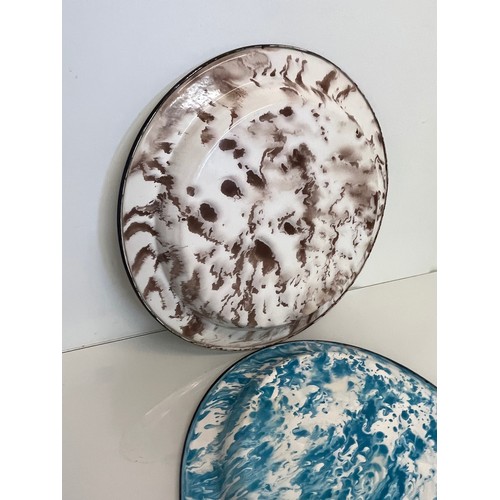 95 - Two large white enamelled dishes with marbled backs, 45 cm diameter x 4.5 cm deep.

This lot is avai... 