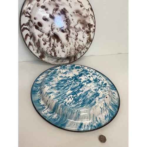 95 - Two large white enamelled dishes with marbled backs, 45 cm diameter x 4.5 cm deep.

This lot is avai... 