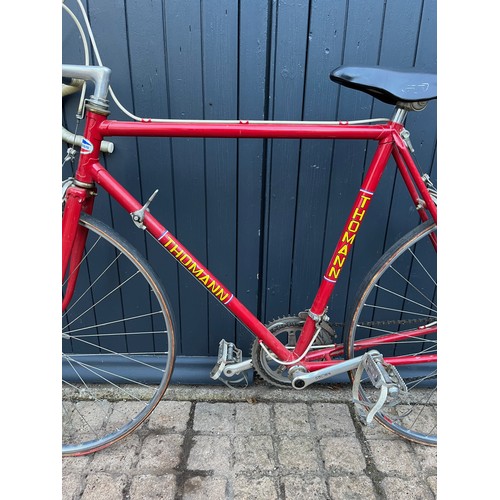 97 - A 1970's Gents Thomann racing bicycle, fitted with Mavic rims, Sulky brake levers, centre pull brake... 