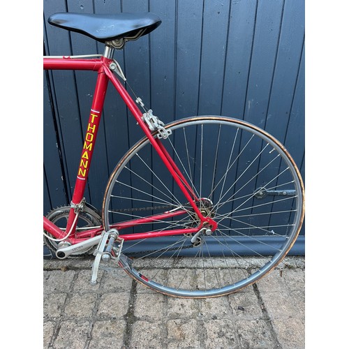 97 - A 1970's Gents Thomann racing bicycle, fitted with Mavic rims, Sulky brake levers, centre pull brake... 