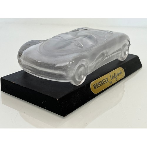 103 - Glass model of a concept car. 20 cm long.

This lot is available for in-house shipping