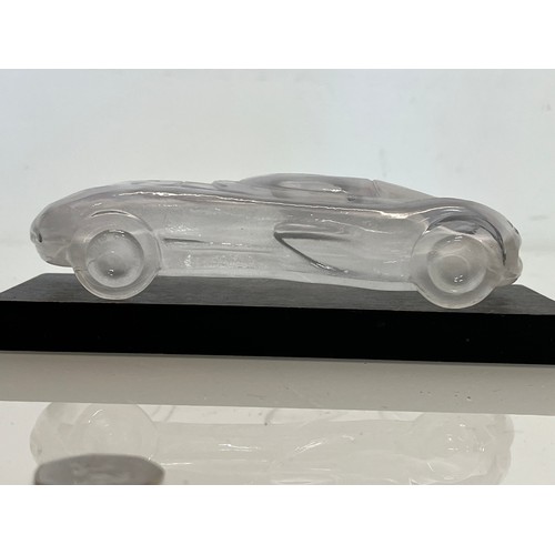 103 - Glass model of a concept car. 20 cm long.

This lot is available for in-house shipping