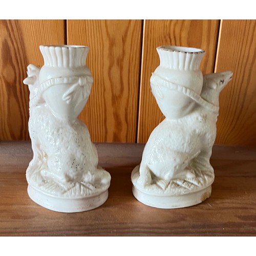 386 - A pair of pottery spill vases modelled as sheep.

This lot is available for in-house shipping