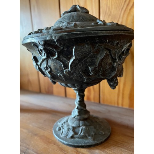 395 - Cast lidded pot decorated with vines and grapes.

This lot is available for in-house shipping