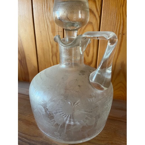 399 - A decanter with wheel cut decoration.

This lot is available for in-house shipping