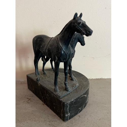 404 - Cast bronzed horse figures of a mother and foal on a marble base.

This lot is available for in-hous... 