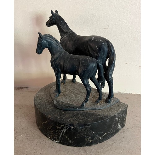 404 - Cast bronzed horse figures of a mother and foal on a marble base.

This lot is available for in-hous... 