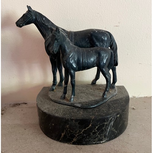 404 - Cast bronzed horse figures of a mother and foal on a marble base.

This lot is available for in-hous... 