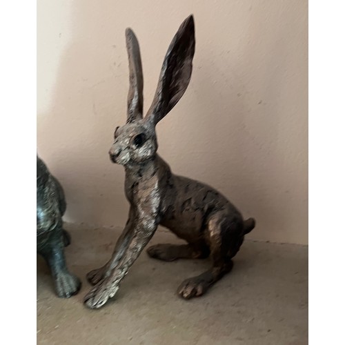 405 - Two cast Geese and a Rabbit and a Hare, Rabbit has damage to an ear.

This lot is available for in-h... 