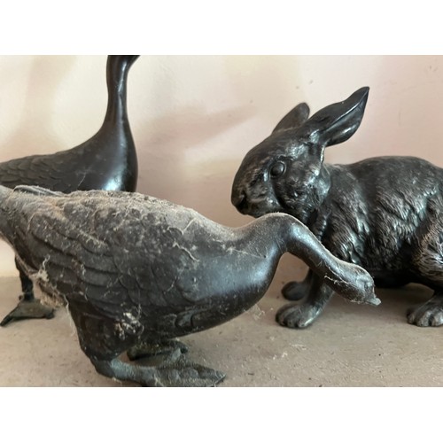 405 - Two cast Geese and a Rabbit and a Hare, Rabbit has damage to an ear.

This lot is available for in-h... 