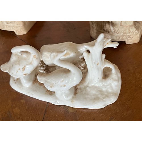 411 - A pair of classical Parian ware figures and a group of ducks.

This lot is available for in-house sh... 