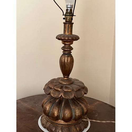 412 - Gilded wooden lamp base, 60 cm high, 22 cm diameter at the base.

This lot is available for in-house... 