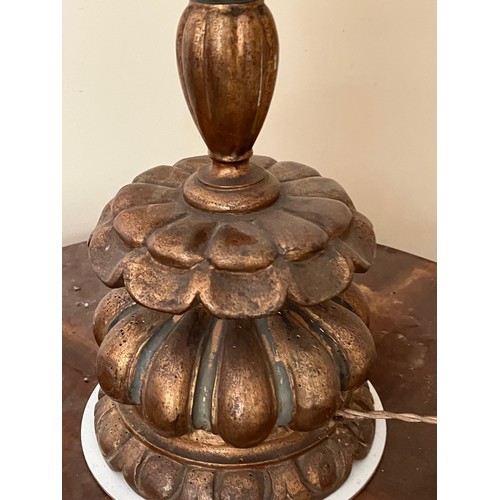 412 - Gilded wooden lamp base, 60 cm high, 22 cm diameter at the base.

This lot is available for in-house... 