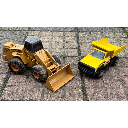 415 - A diecast Ertl brand earth mover and a Tonka dump truck.

This lot is available for in-house shippin... 