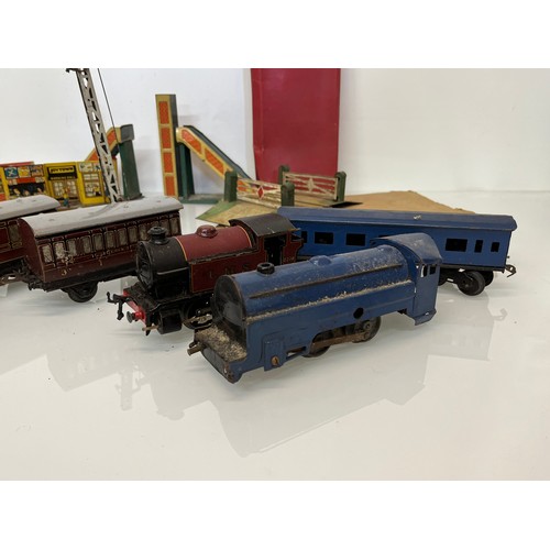 421 - A Hornby O gauge tinplate train set and accessories. Original 101 LMS set box has been used to store... 