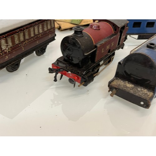 421 - A Hornby O gauge tinplate train set and accessories. Original 101 LMS set box has been used to store... 