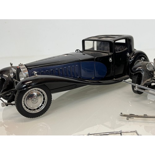 449 - A large diecast model of a Bugatti Royale and another of a Rolls Royce.

This lot is available for i... 