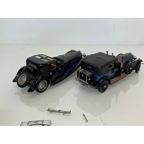 449 - A large diecast model of a Bugatti Royale and another of a Rolls Royce.

This lot is available for i... 