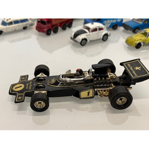 450 - A collection of diecast toy cars and racing cars.

This lot is available for in-house shipping